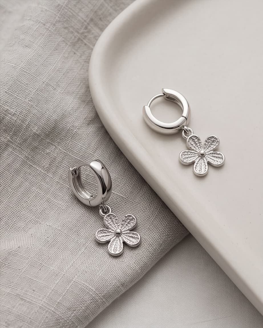 FORGET ME KNOT HUGGIE EARRINGS