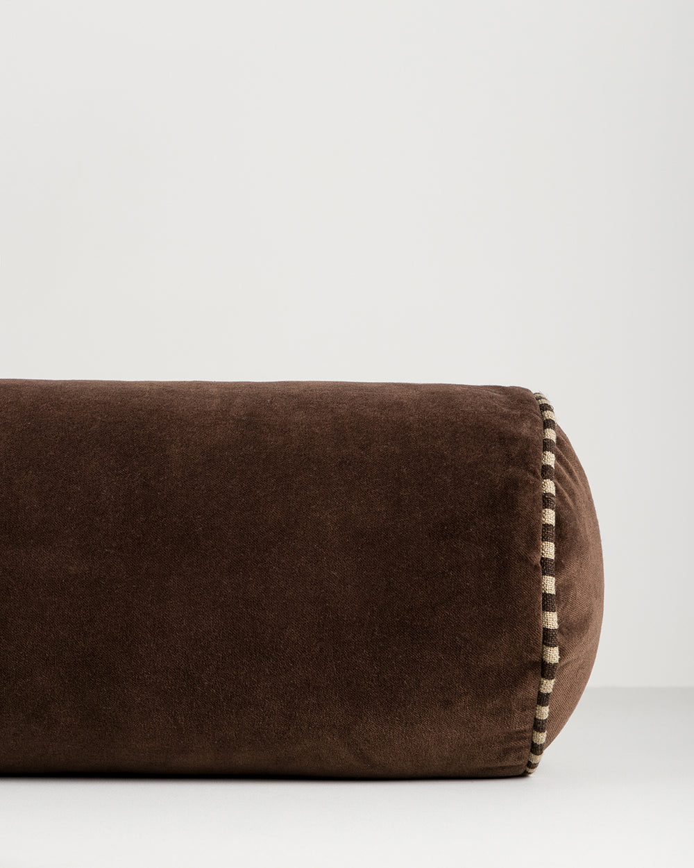 ELLIOT VELVET BOLSTER CUSHION - CHOCOLATE