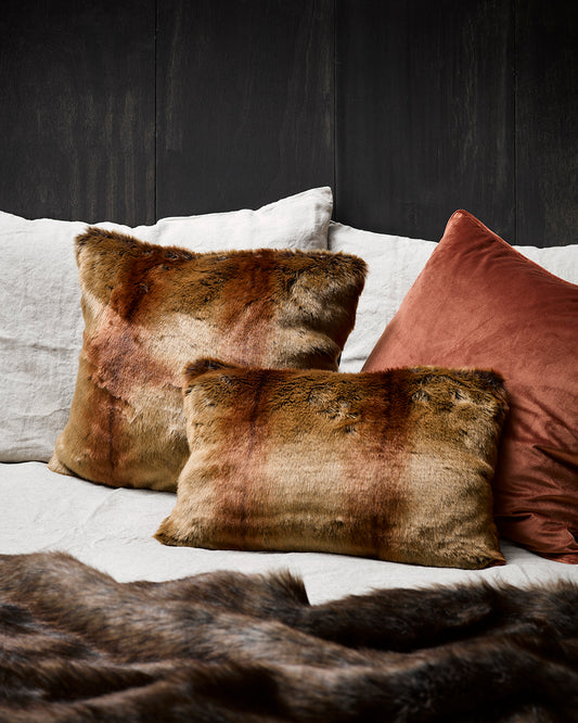 RED LEMUR FAUX FUR CUSHIONS